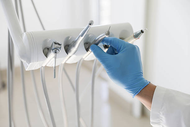 Professional Tooth Extraction technician working in Byram Center, NJ